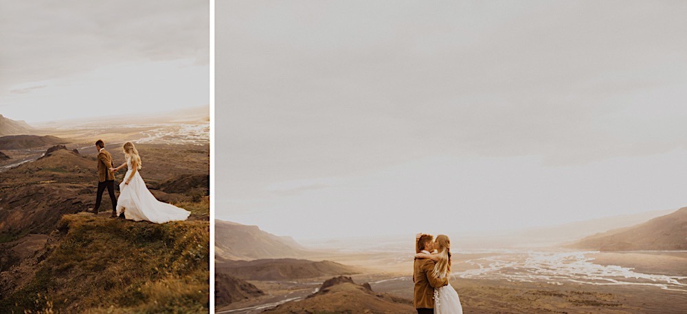 couple walks along mountaintop