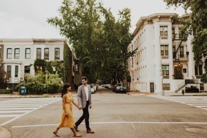 Couple crosses street in Washington DC