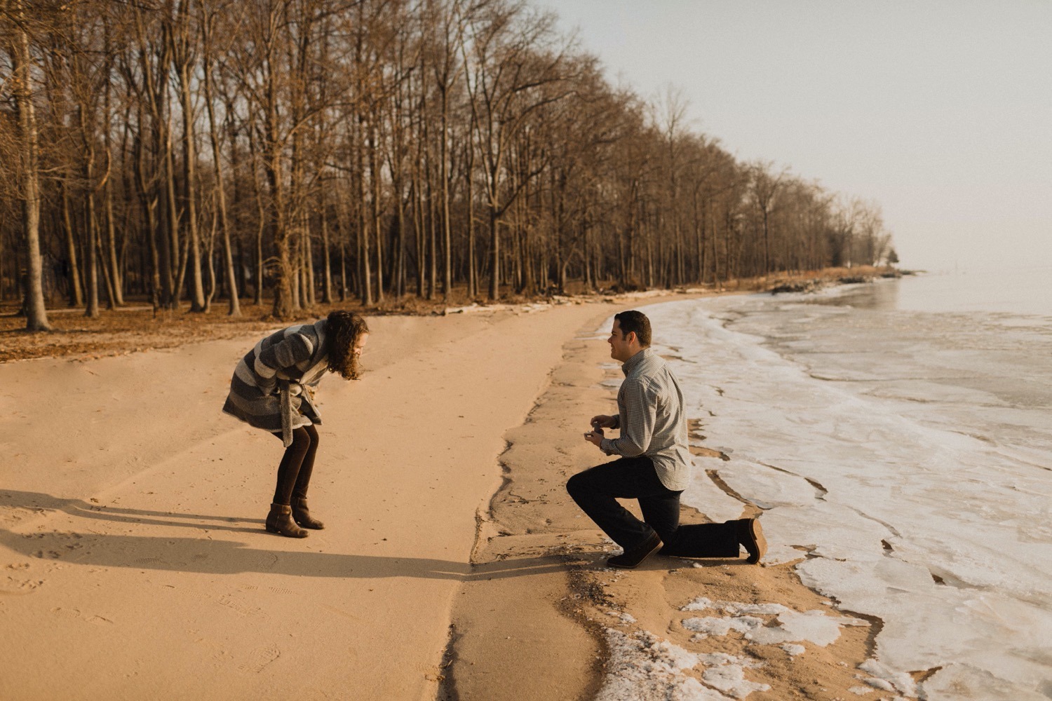 girl is shocked from boyfriend proposing to her