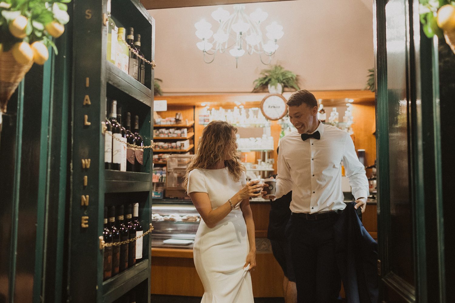 bride and groom get coffee at coffee shop