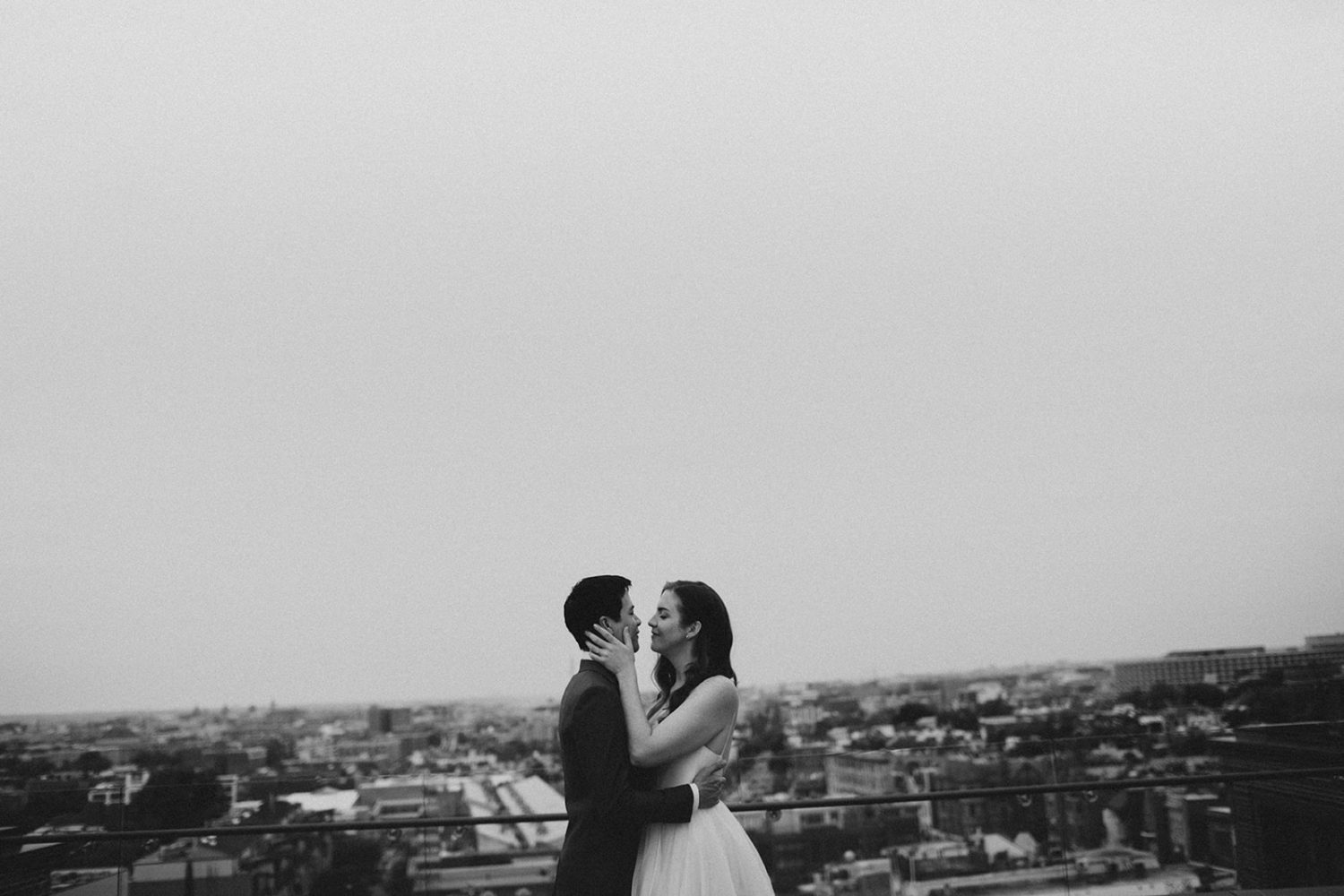 Couple embrace at the line dc hotel rooftop