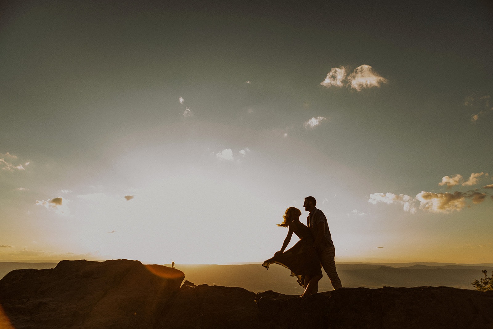 Couple embraces at sunset Shenandoah National Park Adventure Session