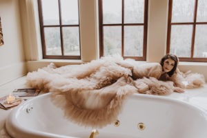 bride has bridal boudoir session at dover hall