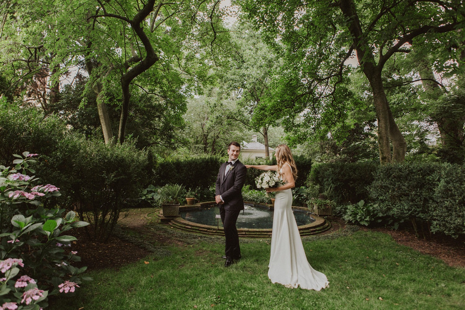 Couple has first look in garden at Georgetown Tudor Place wedding