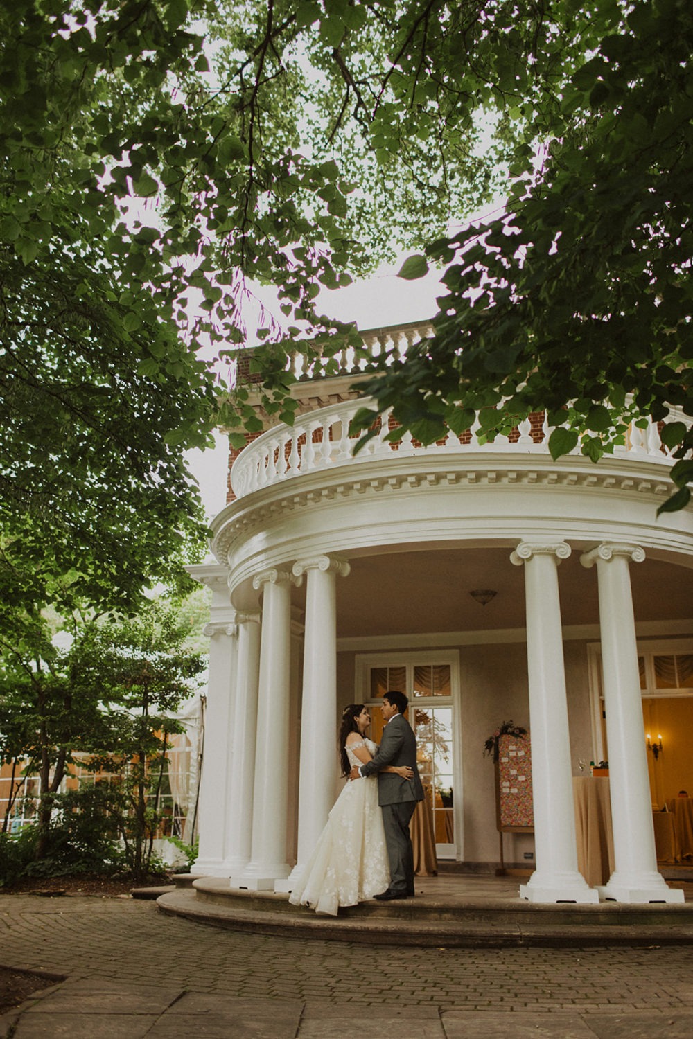 Couple embraces at Woodend Sanctuary & Mansion wedding