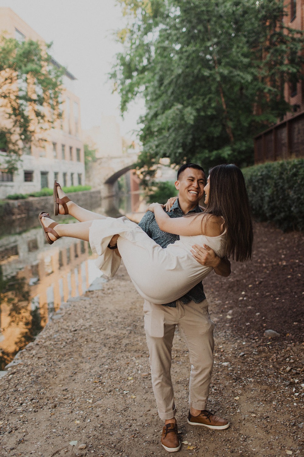 Couple laughs at Georgetown engagement session