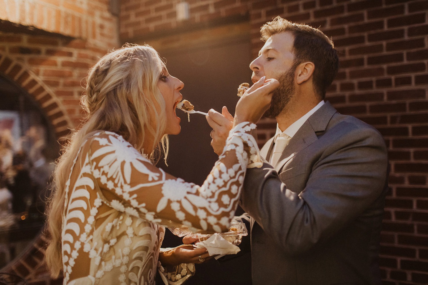 Couple feeds each other dessert at Toolbox DC wedding