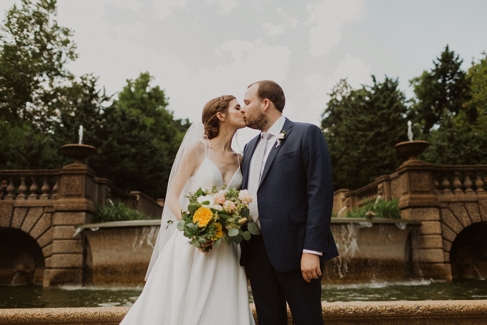 Couple kisses at DC garden wedding venue