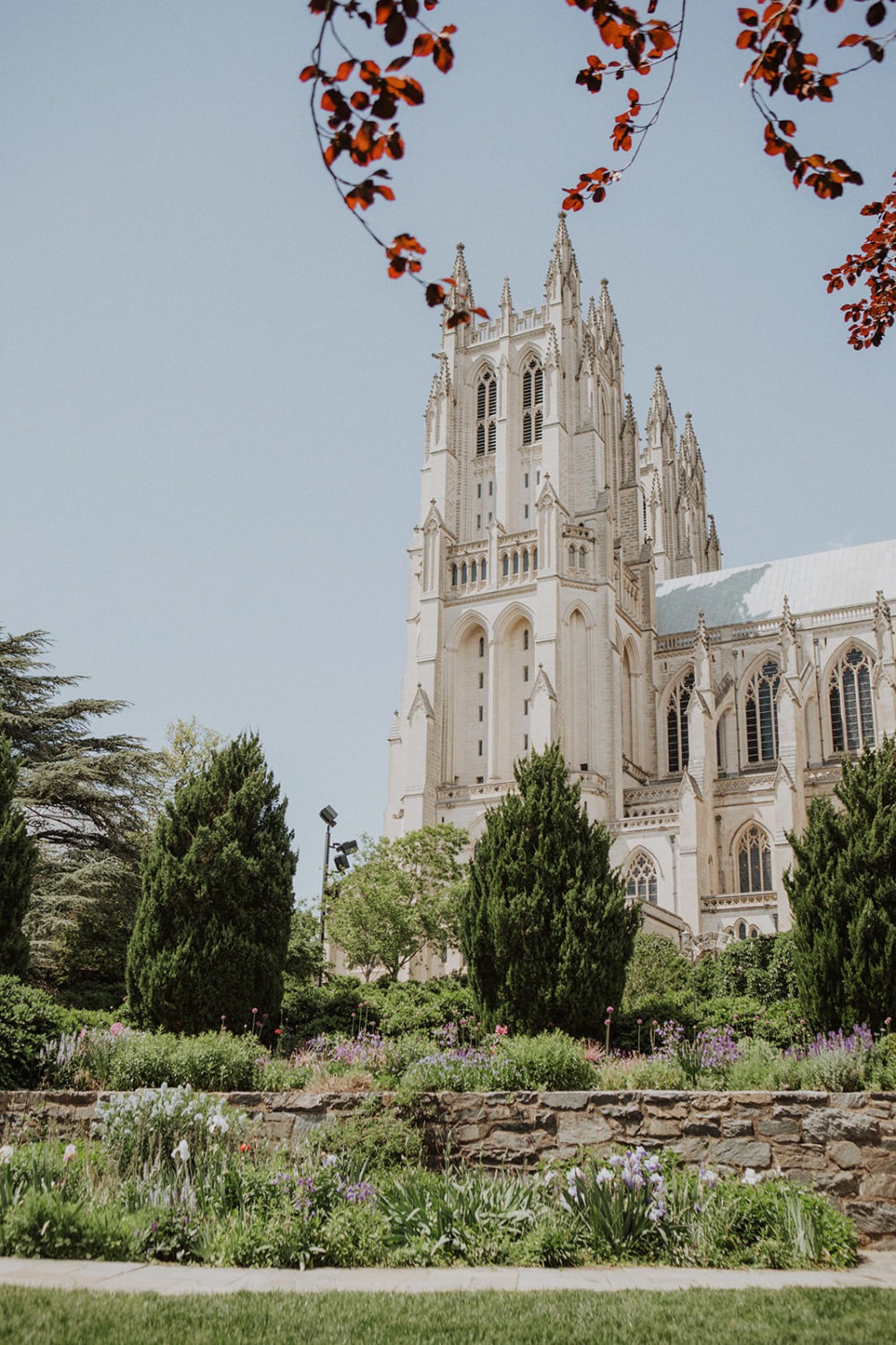 National Cathedral in Washington DC surrounded by spring flowers