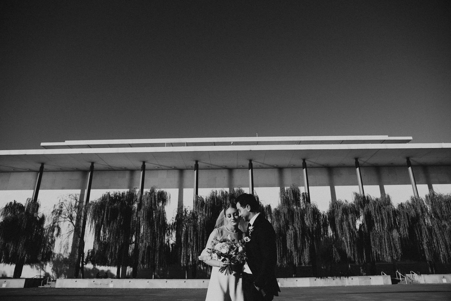 Couple embraces at Kennedy Center Washington DC wedding