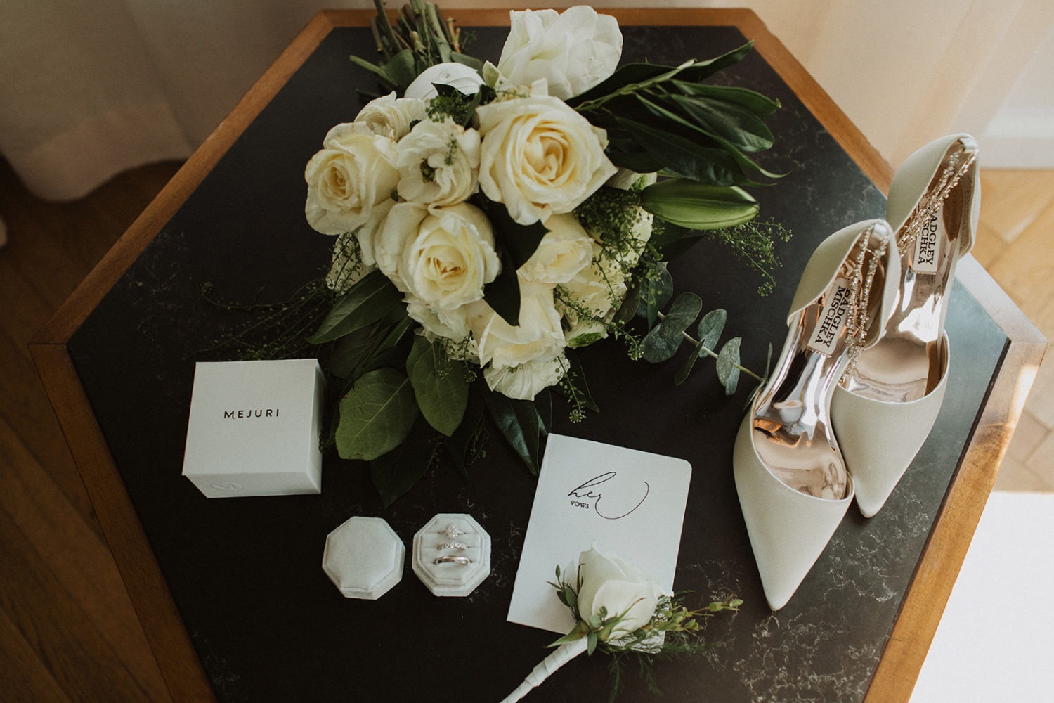 Flat lay of wedding bouquet and accessories