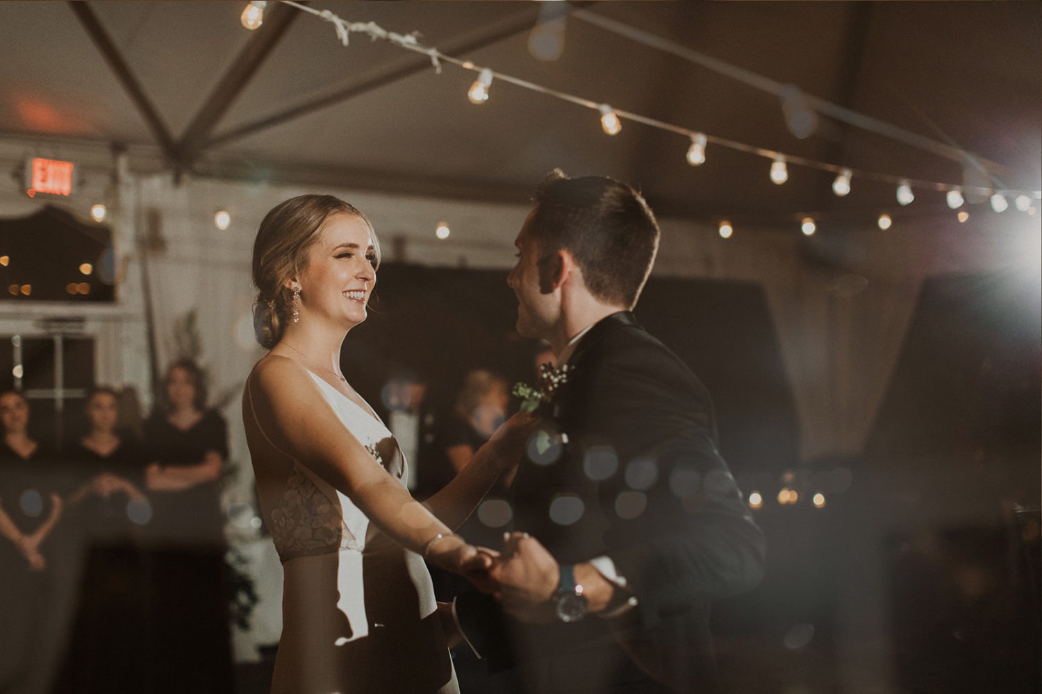 Couple dances at wedding reception captured by wedding videographer