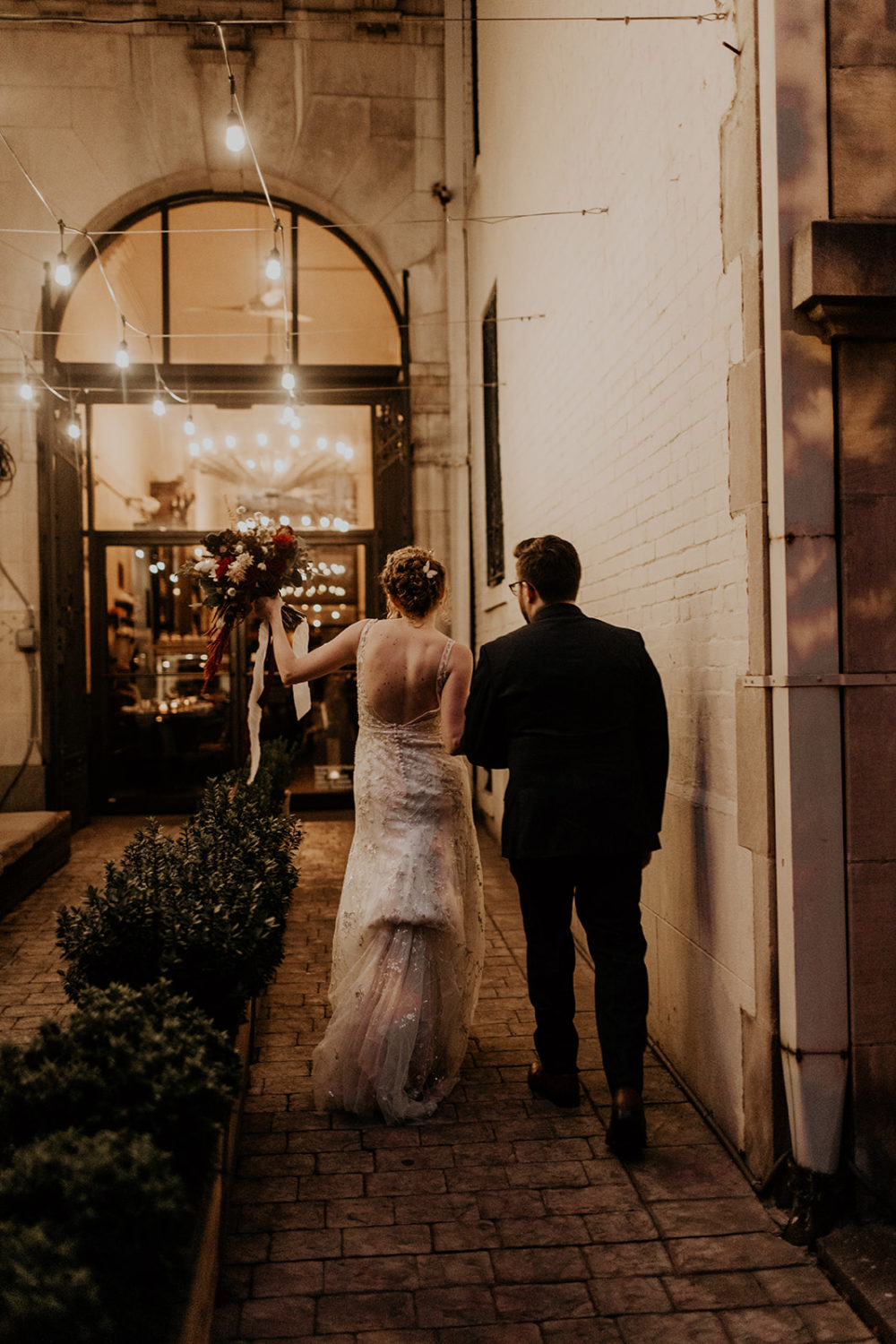 Couple walks into reception at Washington DC wedding