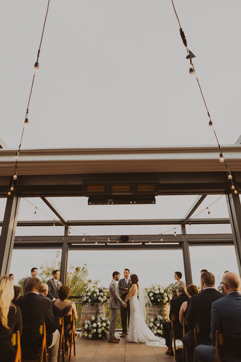 Couple exchanges vows at District Winery rooftop ceremony 