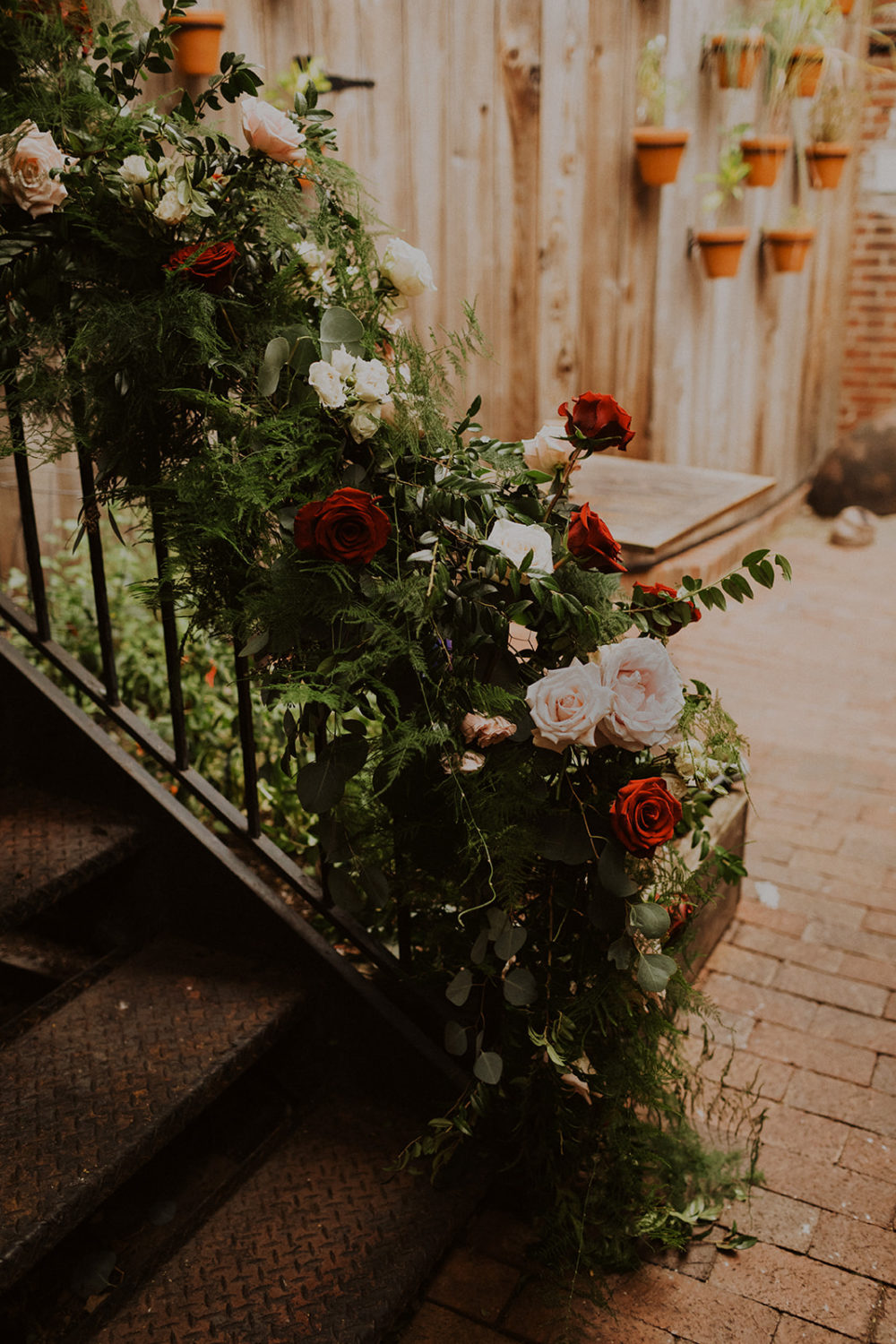 Roses decorate the railing of this DC wedding venue 