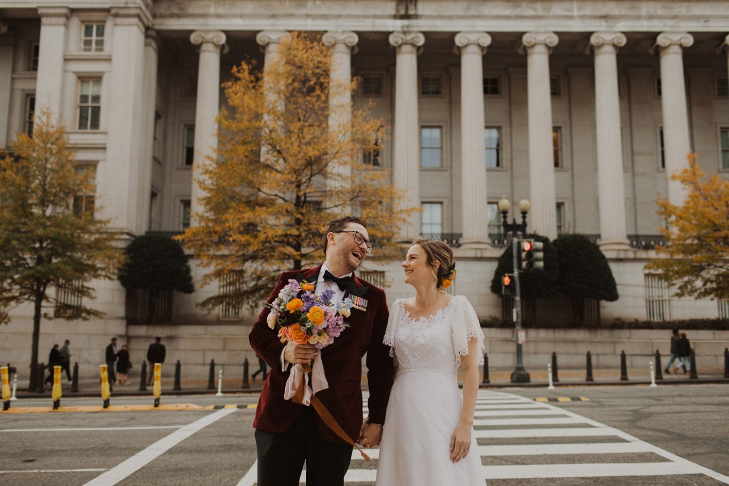 Couple stands in city streets at Hotel Washington, Washington DC wedding