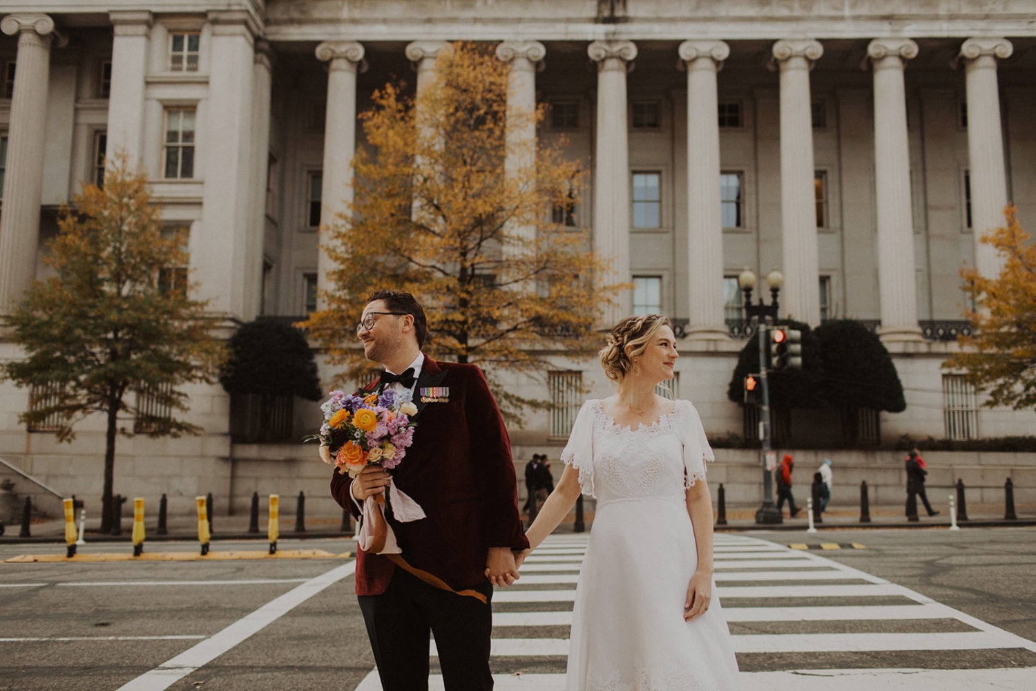 Couple holds hands in the city at Hotel Washington, Washington DC wedding