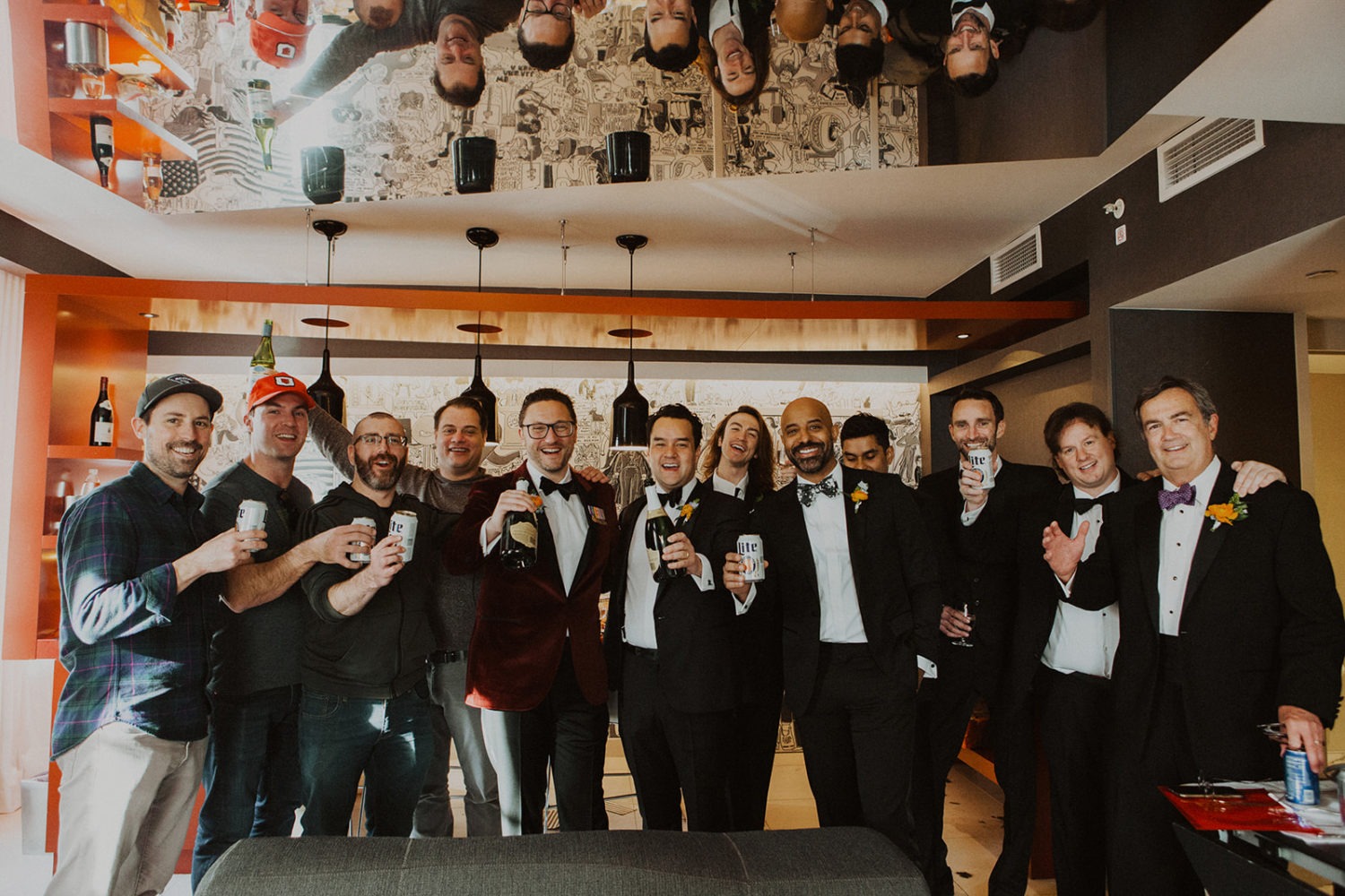 Groom cheers with groomsmen at Hotel Washington, Washington DC wedding