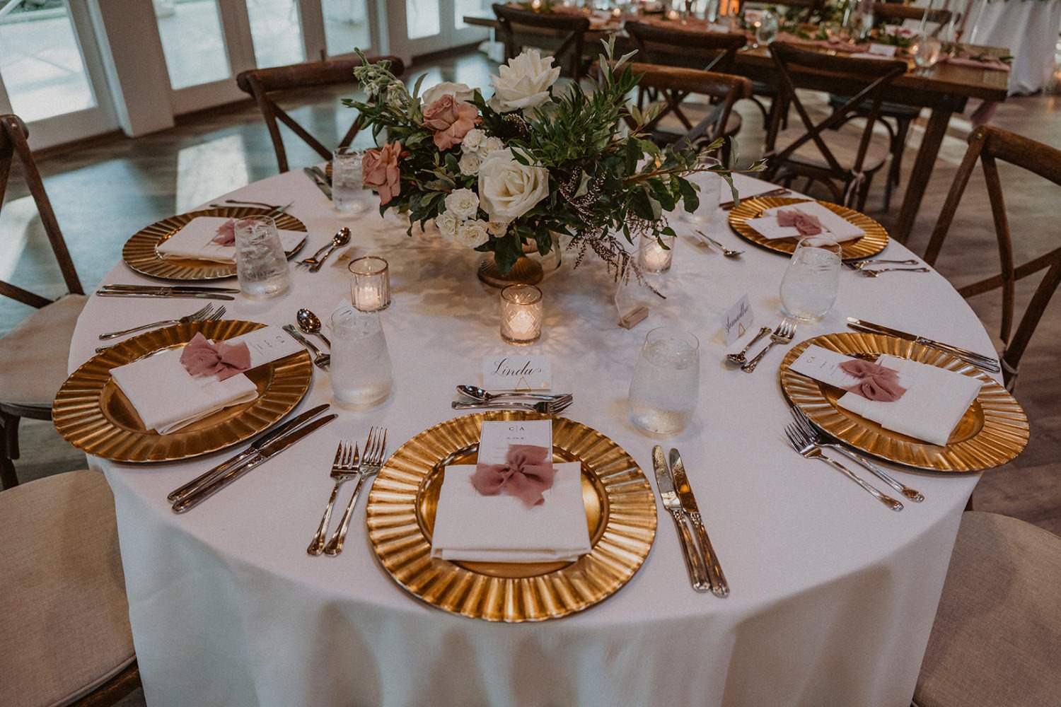 table setting with florals at Airlie Warrenton, VA wedding 