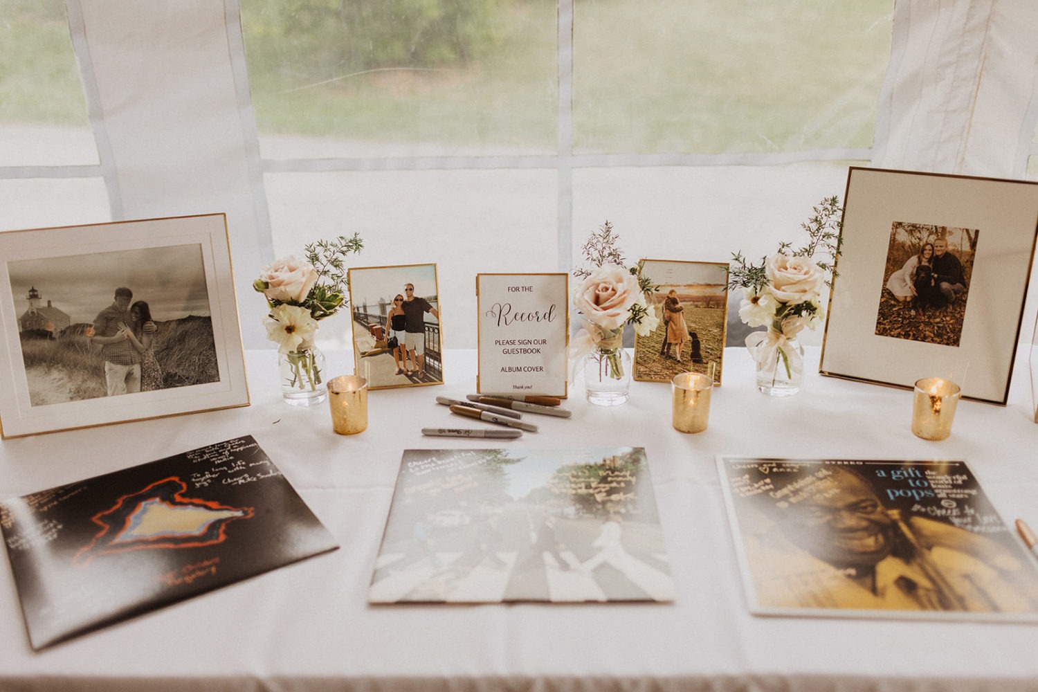 couple's photos and vinyl records on display