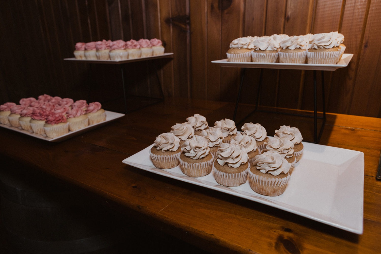 cupcakes on trays at wedding reception