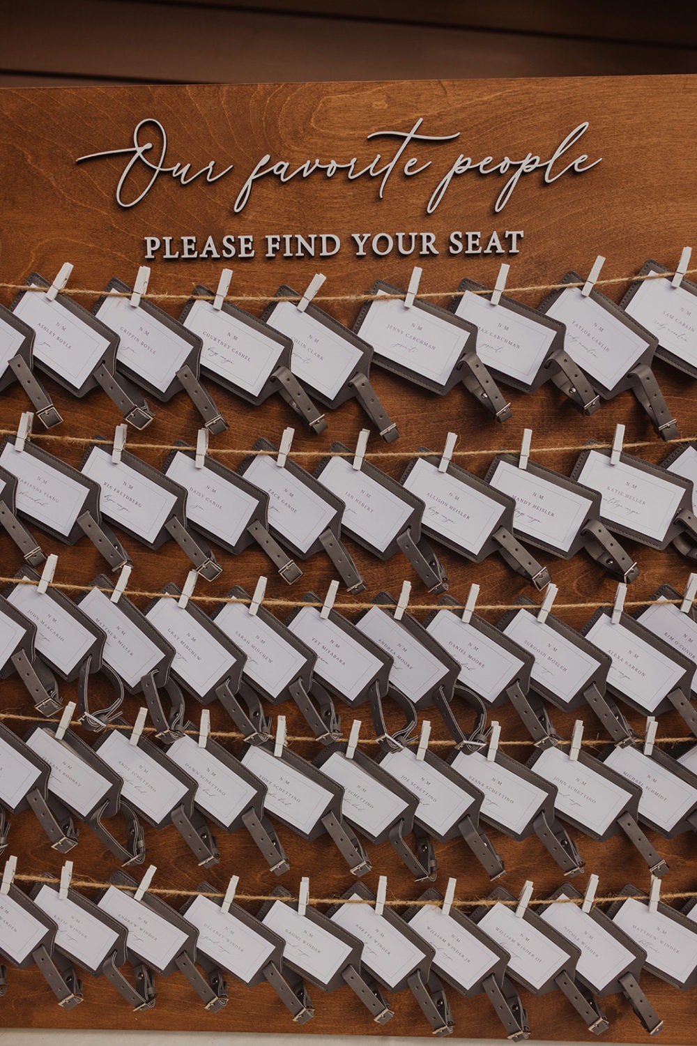 luggage tags as seating charts for wedding reception