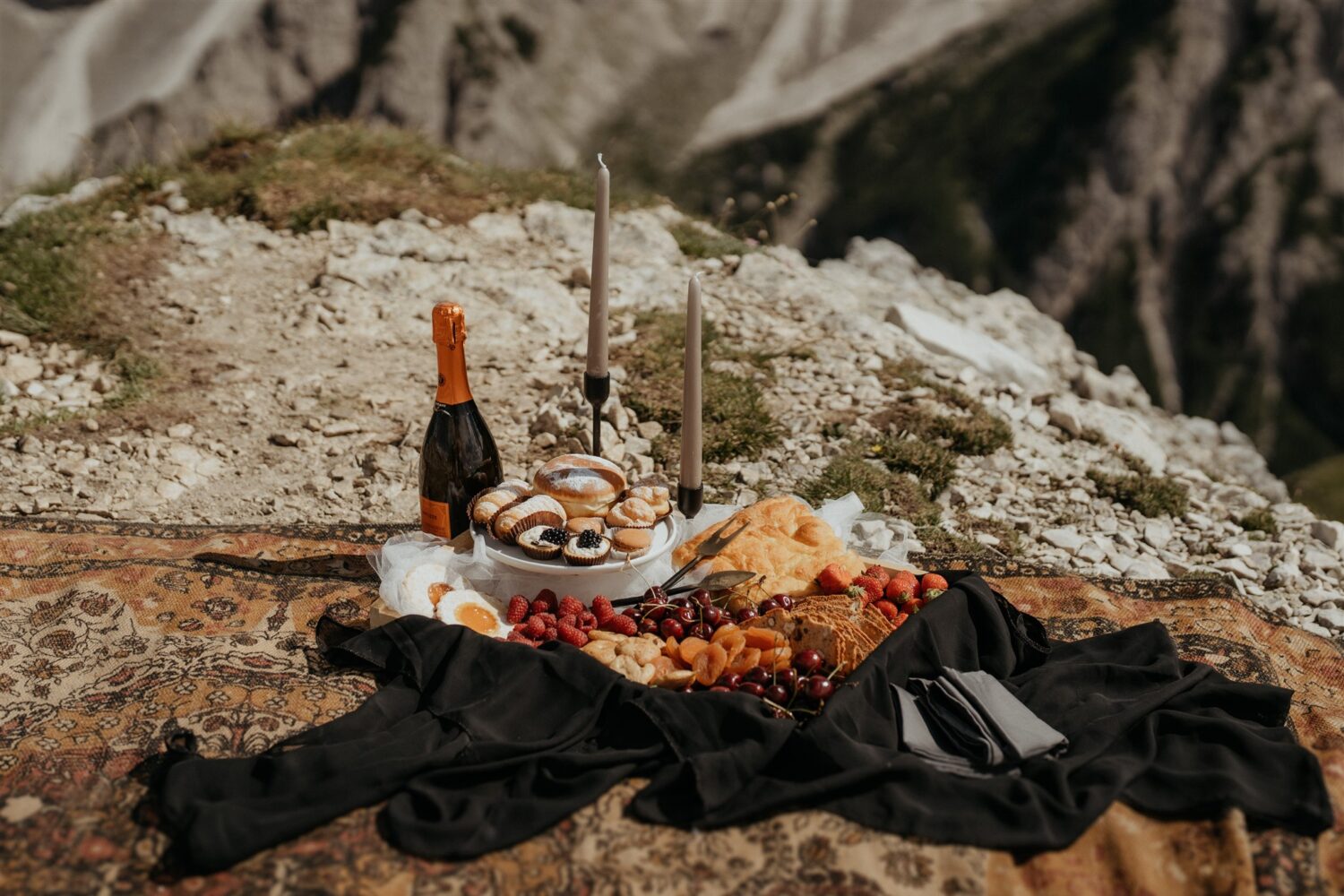 charcuterie picnic on mountaintop at the Dolomites