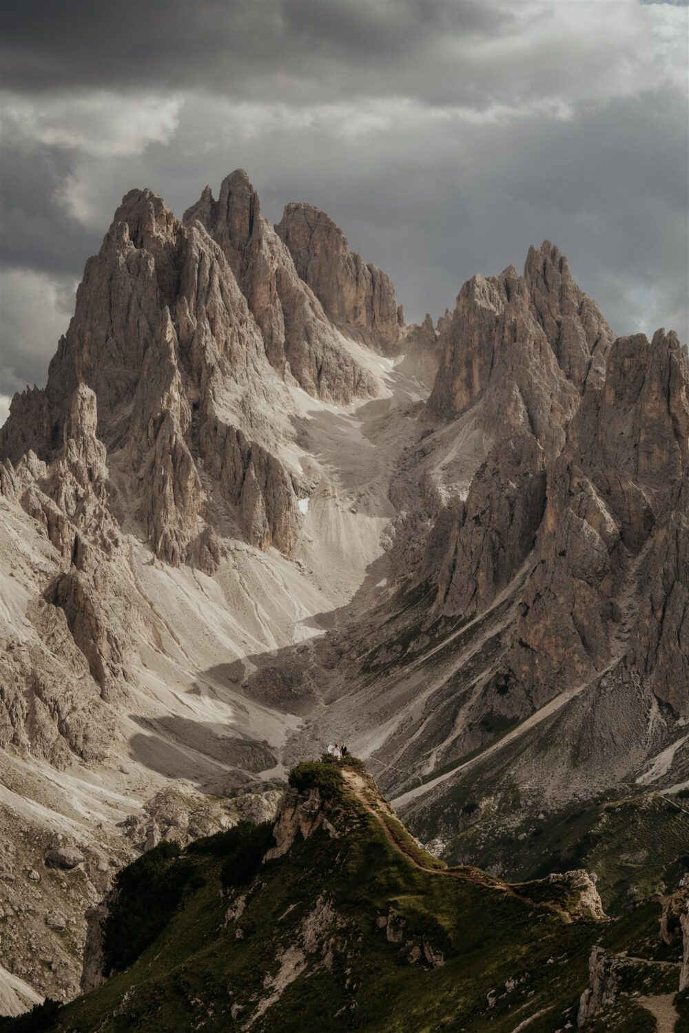 dark clouds gather over the Italian Dolomites