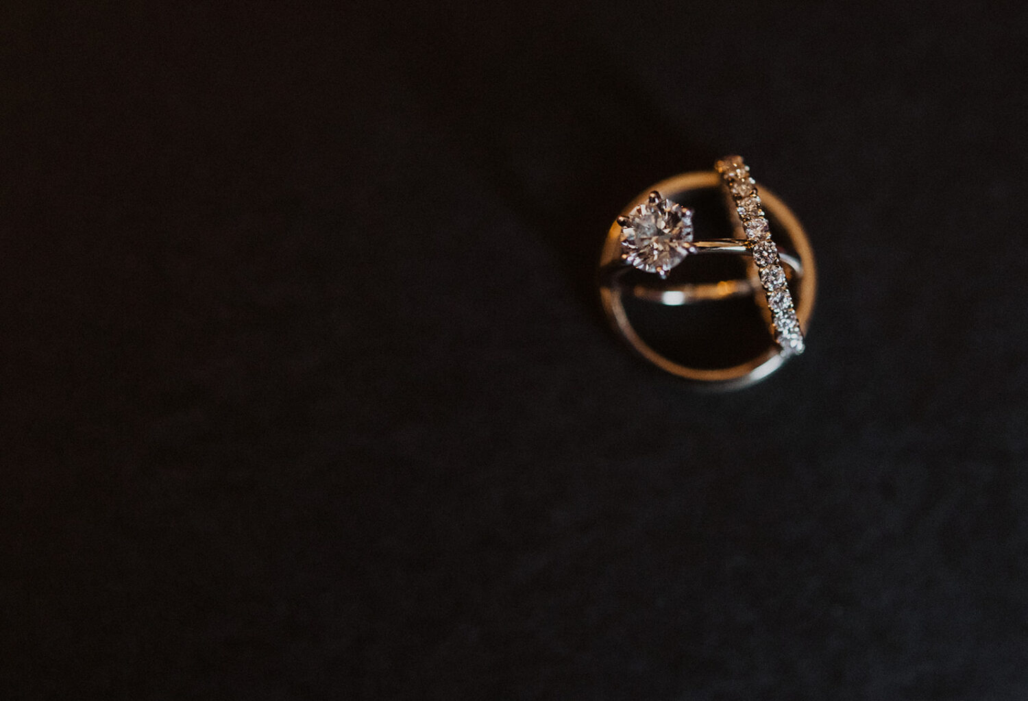 gold diamond rings intertwined at baltimore wedding 