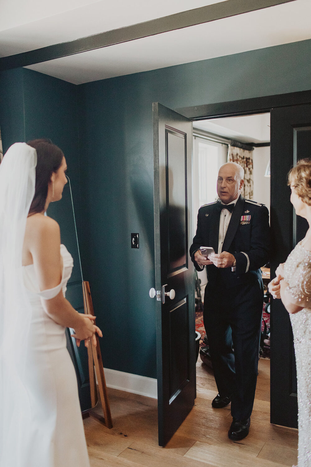 dad reacts during bride first look at hotel