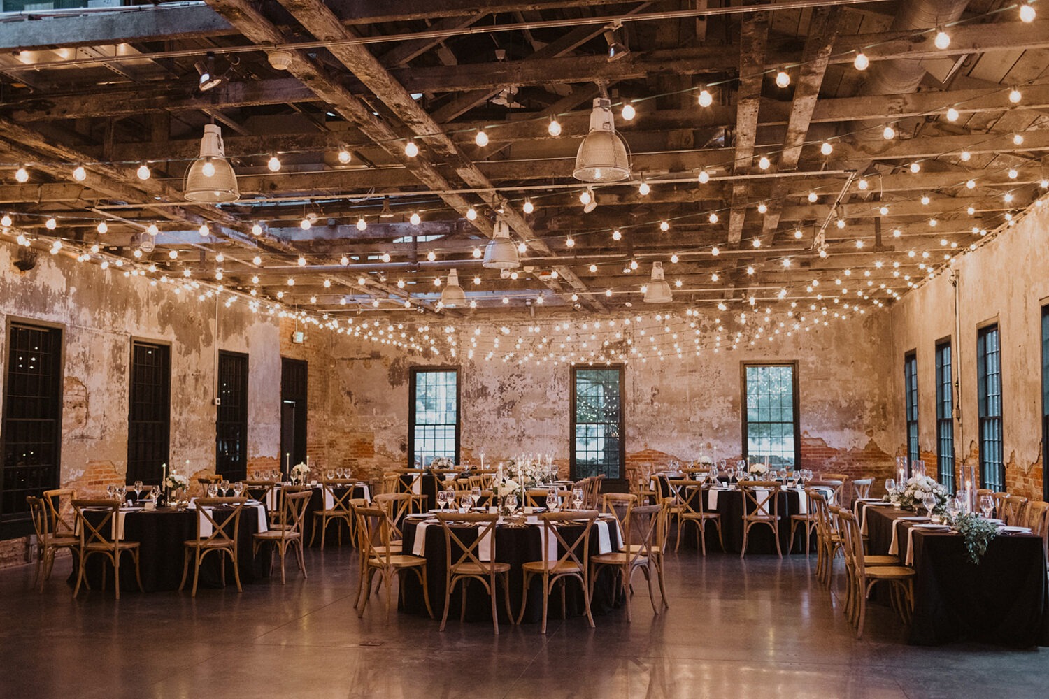 twinkle lights and floral decor at Mt. Washington Mill Dye House wedding venue