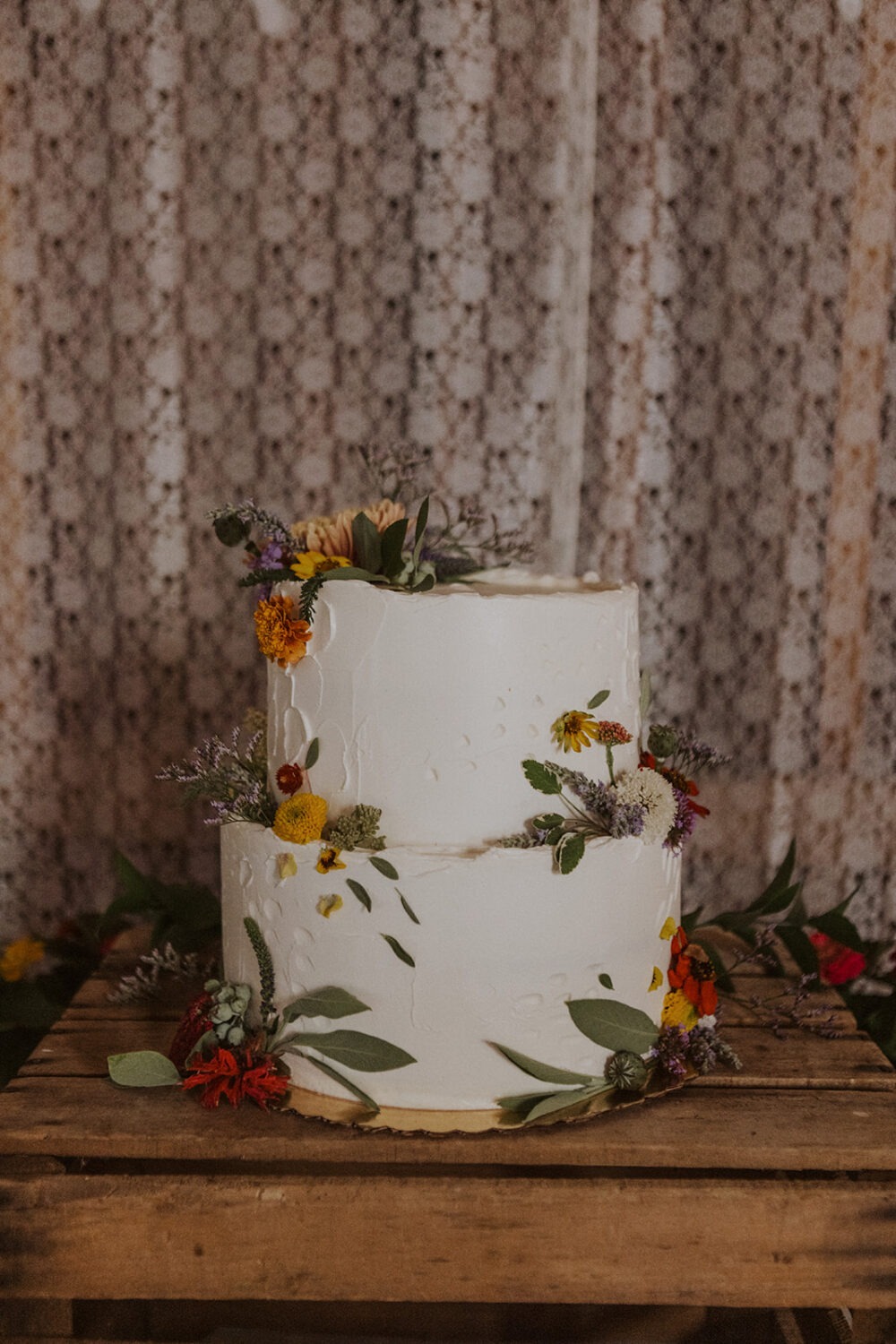 flowers decorate white wedding cake