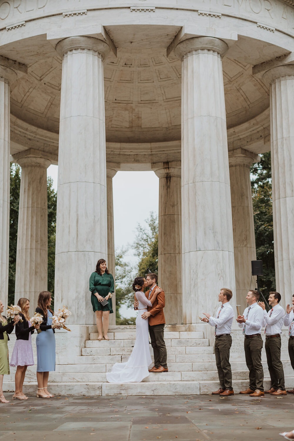 wedding officiant knows how to officiate a wedding and stands to the side