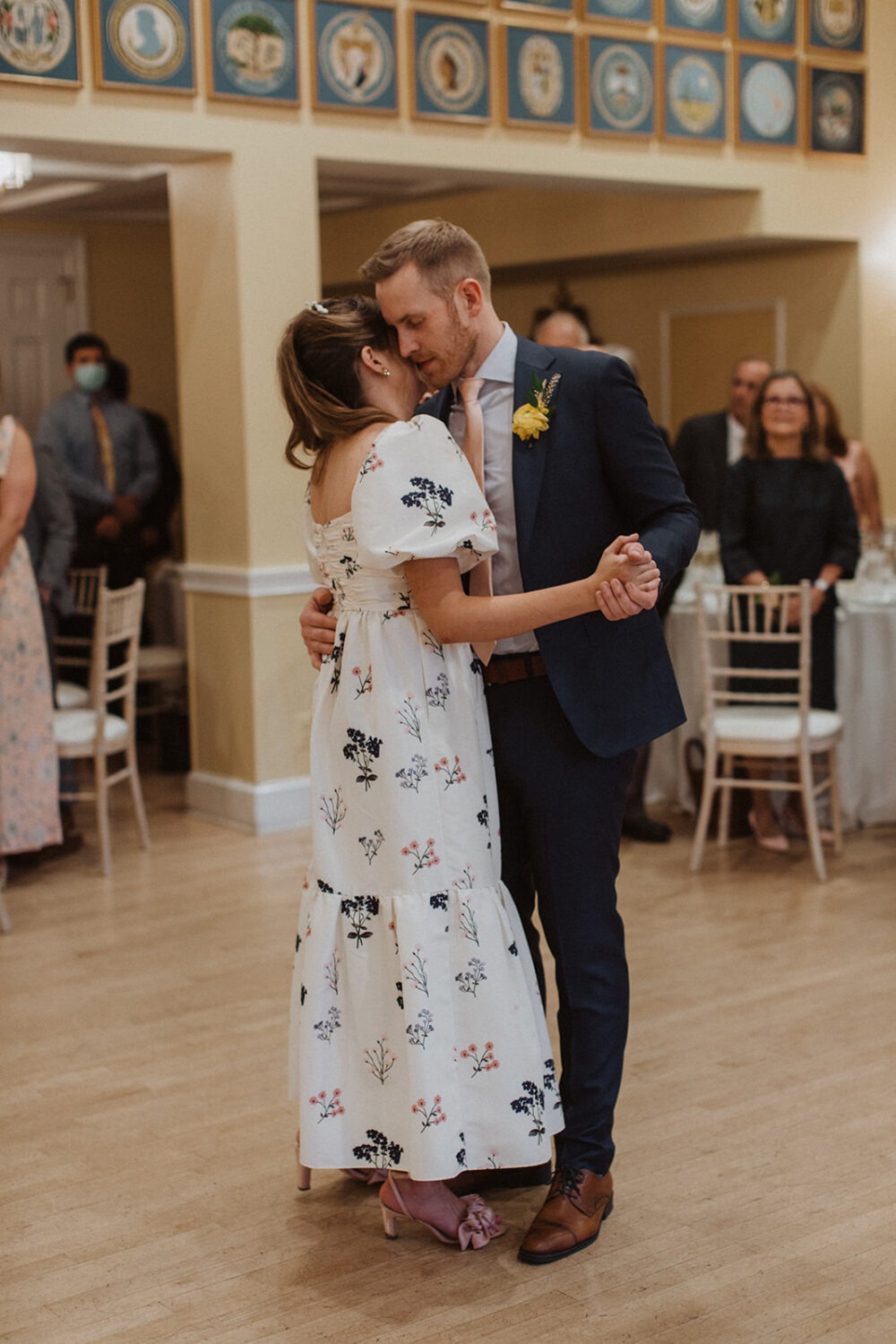 couple has first dance during wedding reception