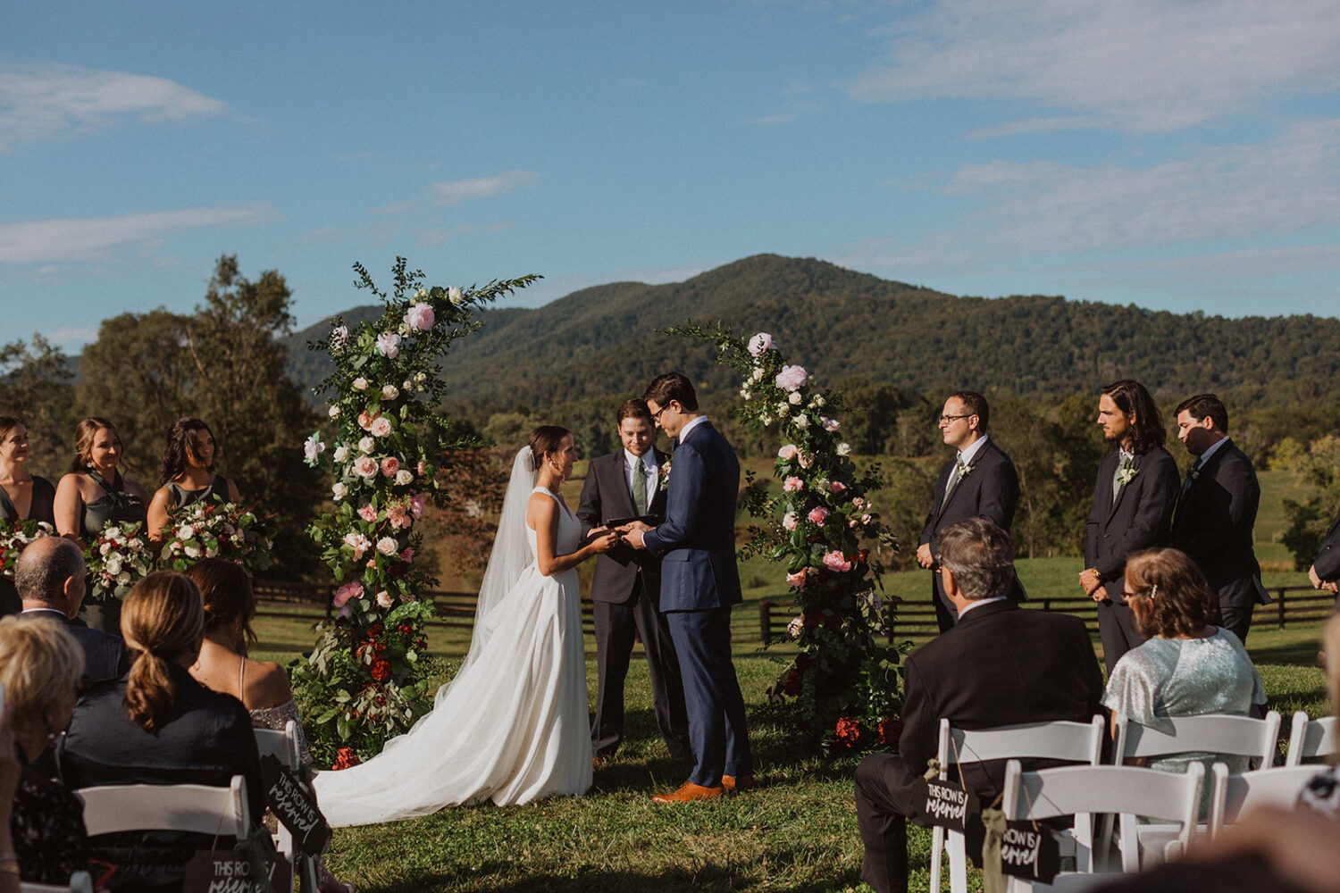couple exchanges vows during mountainside ceremony