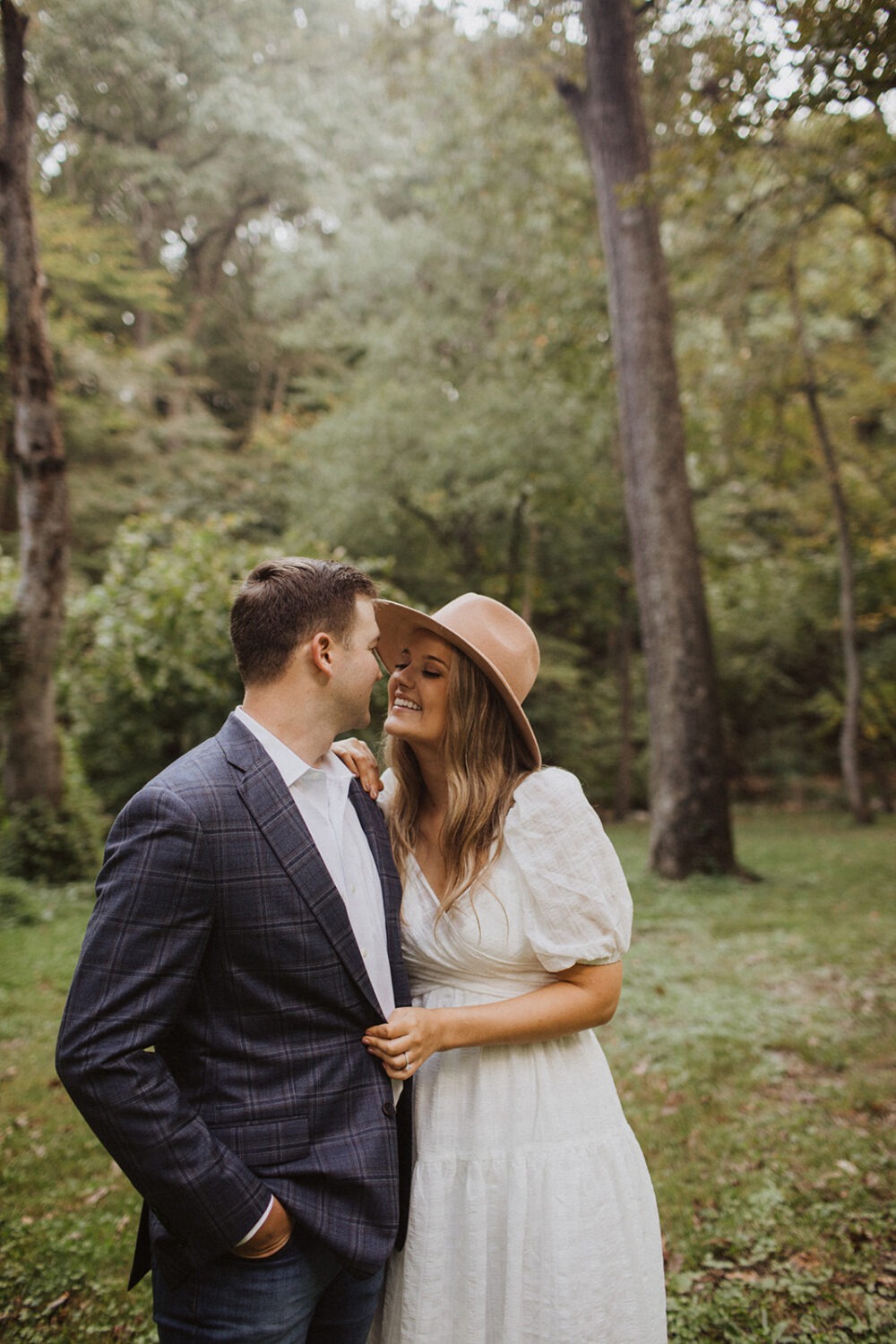 couple embraces at outdoor engagement session