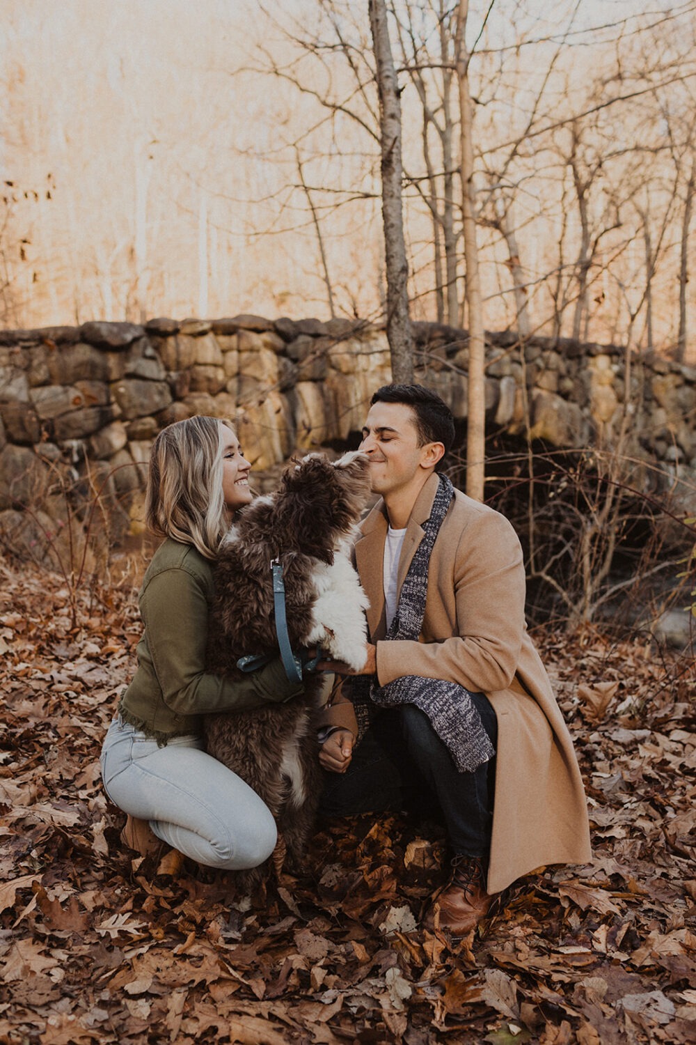 dog kisses couple at fall engagement session