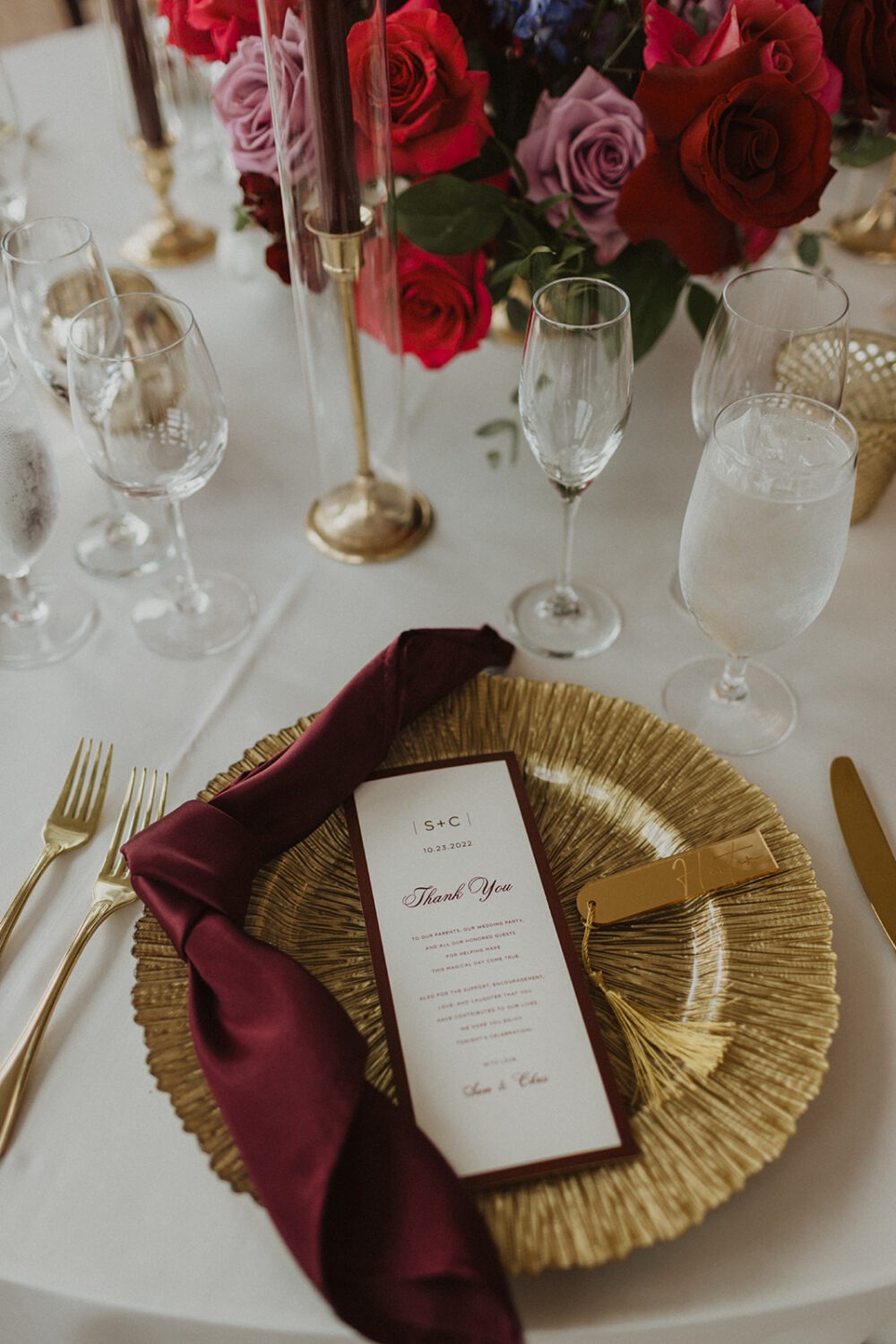 golden wedding decor on reception table incorporates wedding planning tips