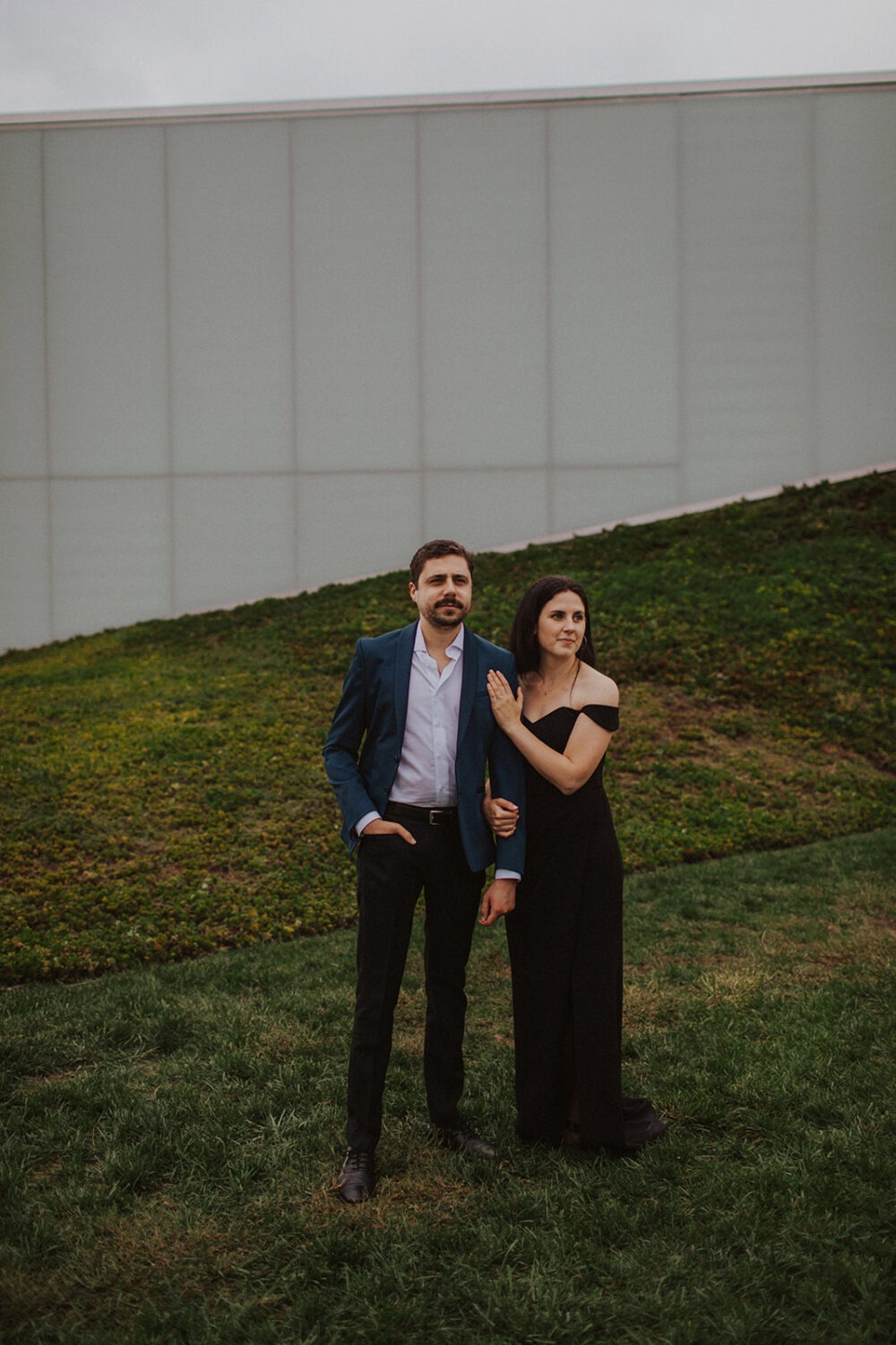 couple holds hands at Kennedy Center DC engagement session