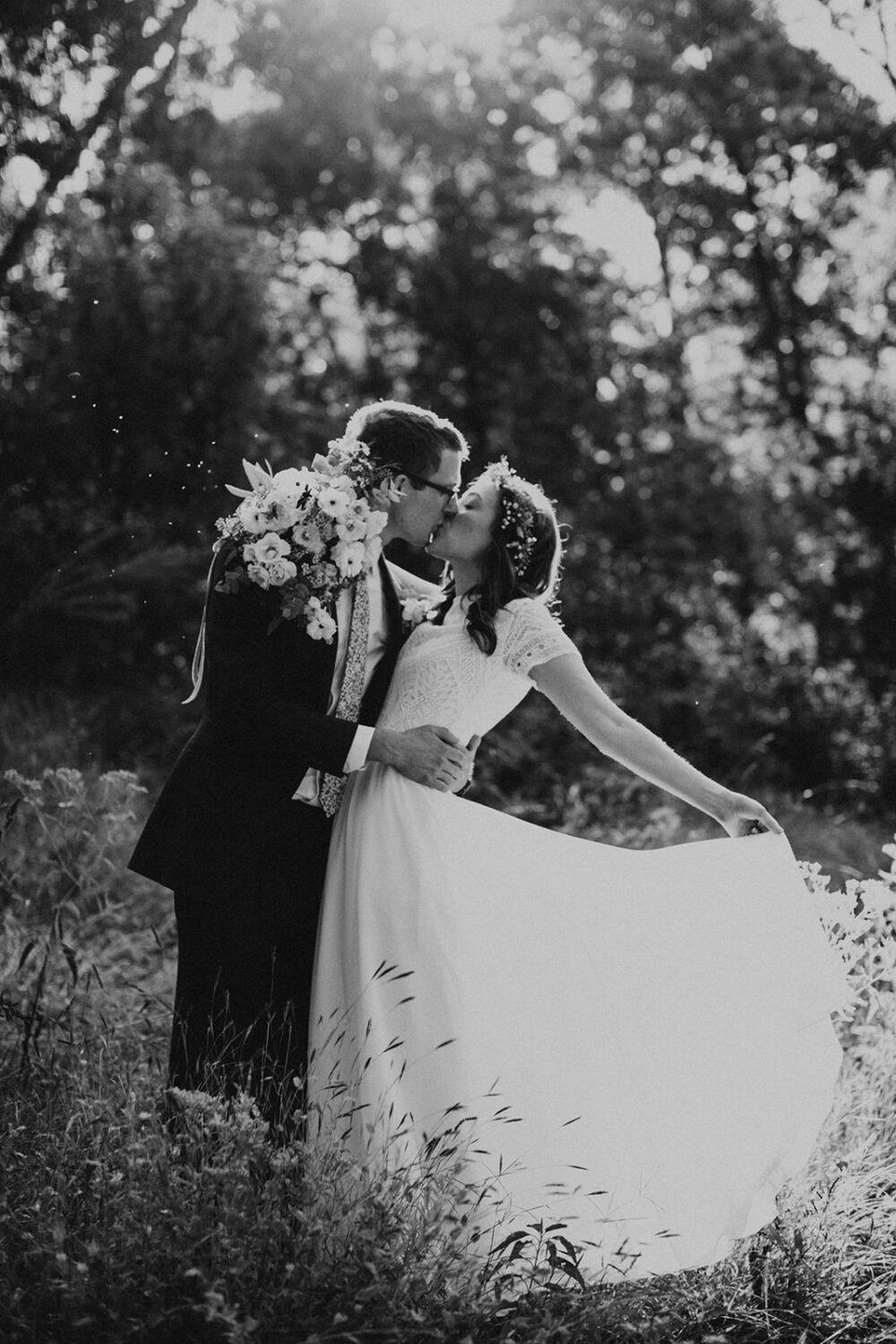 couple kisses in field at sunset Virginia elopement