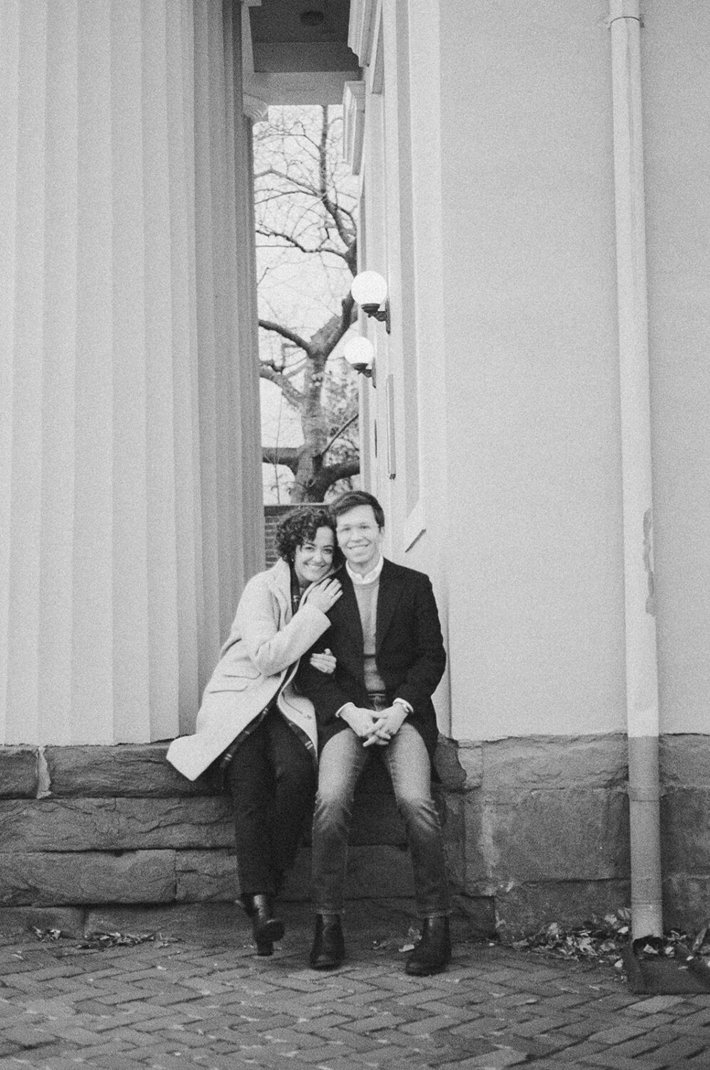 couple poses together at Old Town Alexandria engagement session
