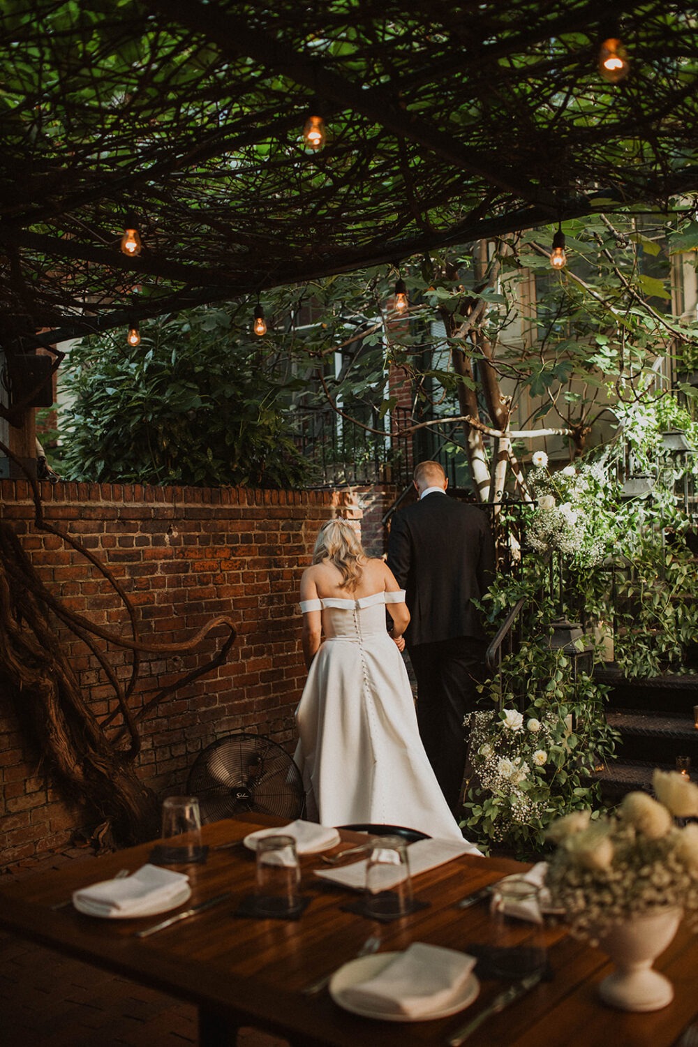 couple has reception first look at Iron Gate Restaurant DC intimate wedding