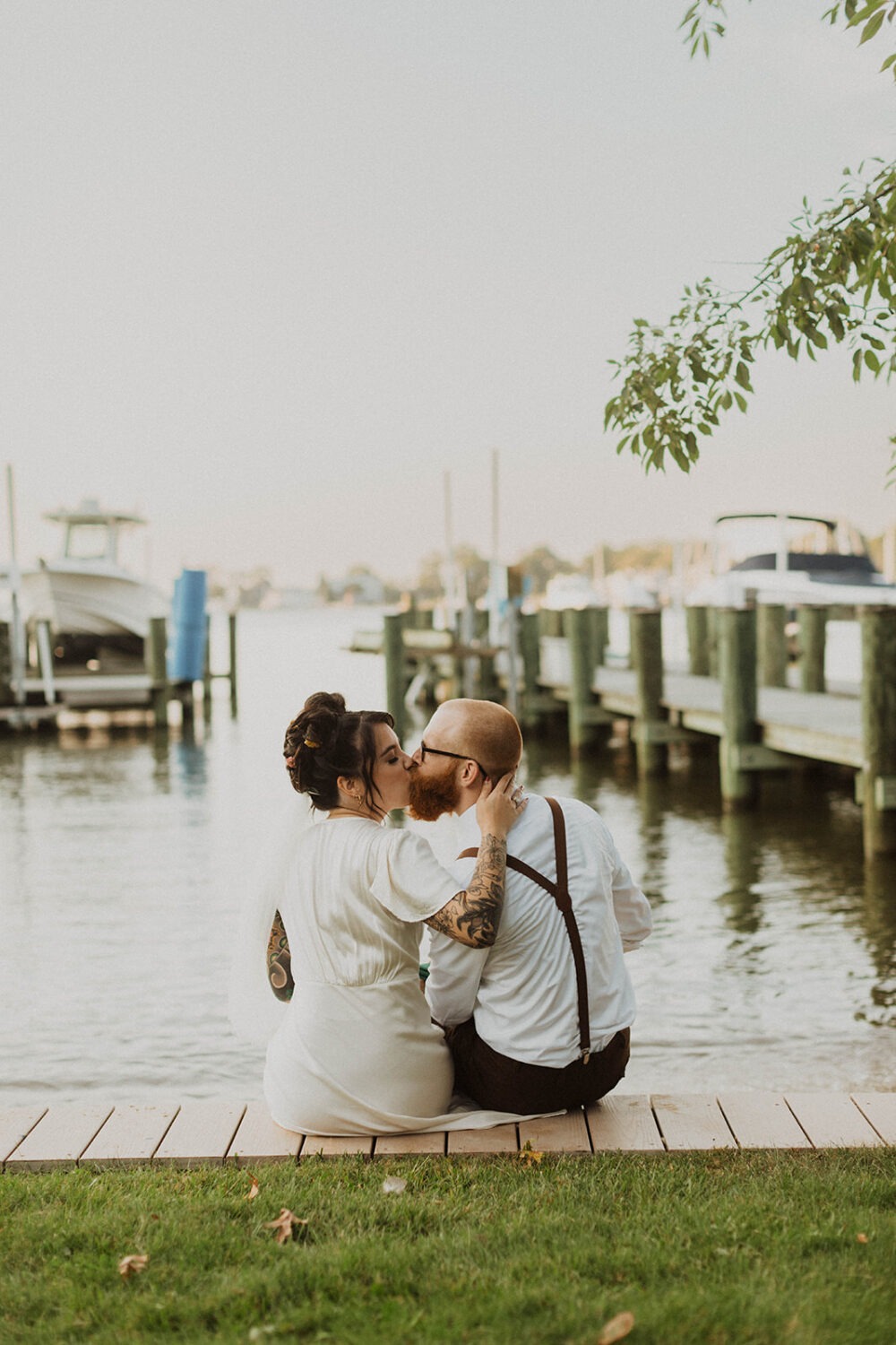 couple kisses at waterfront