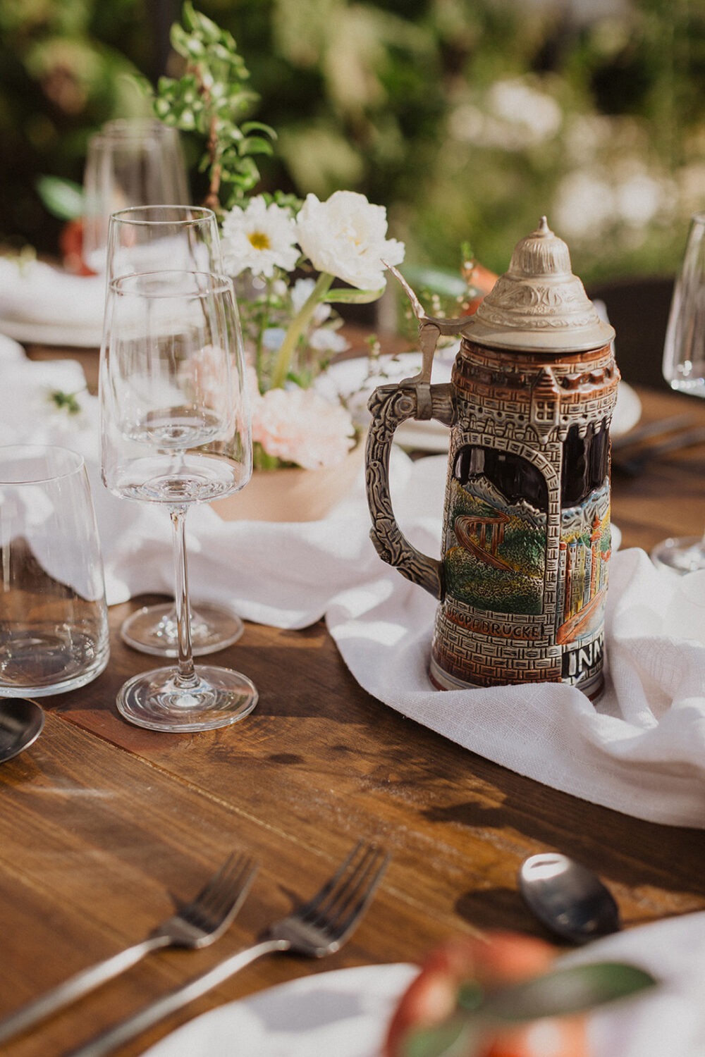 german beer steins on wedding reception table 