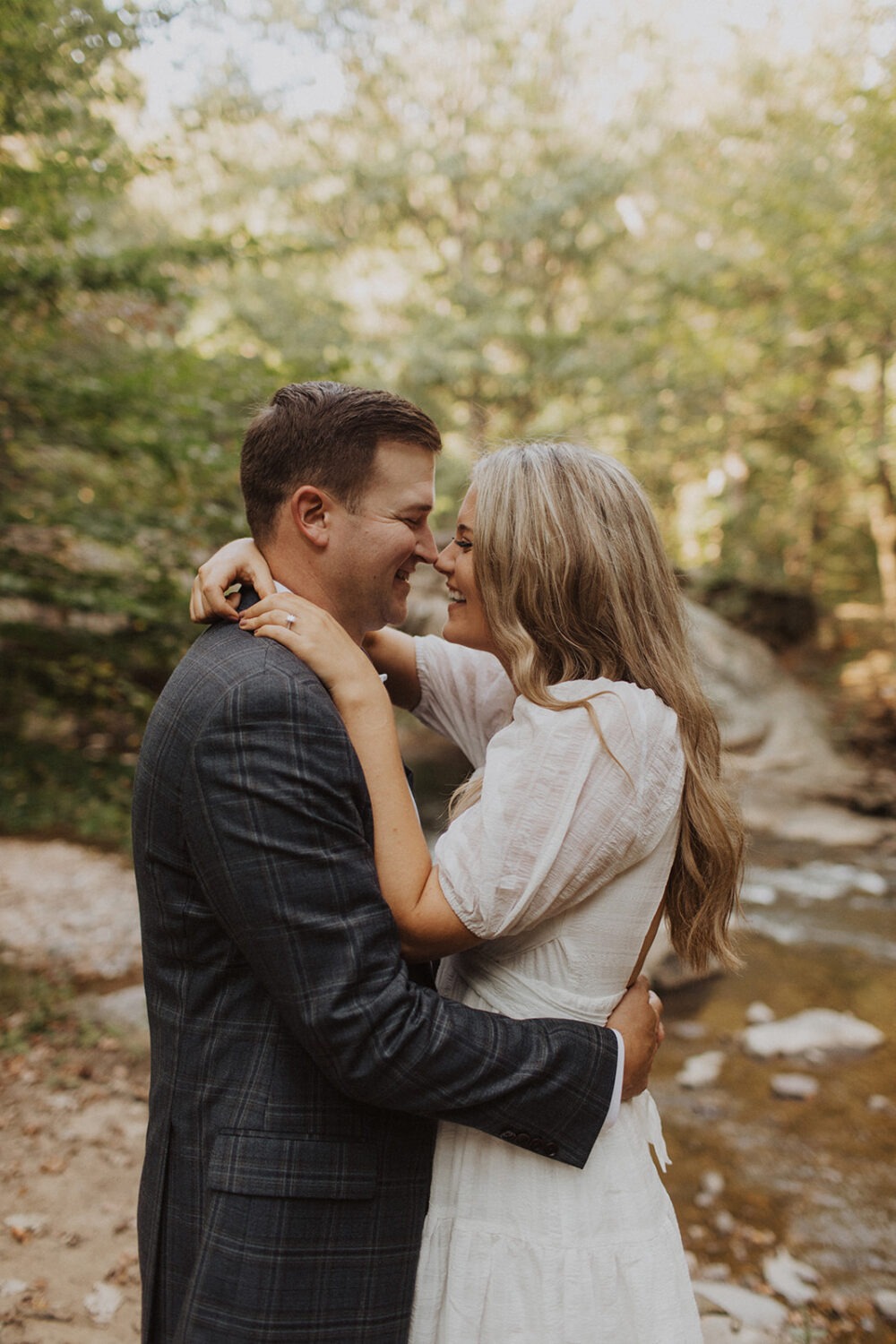 couple kisses for Rock Creek Park photos