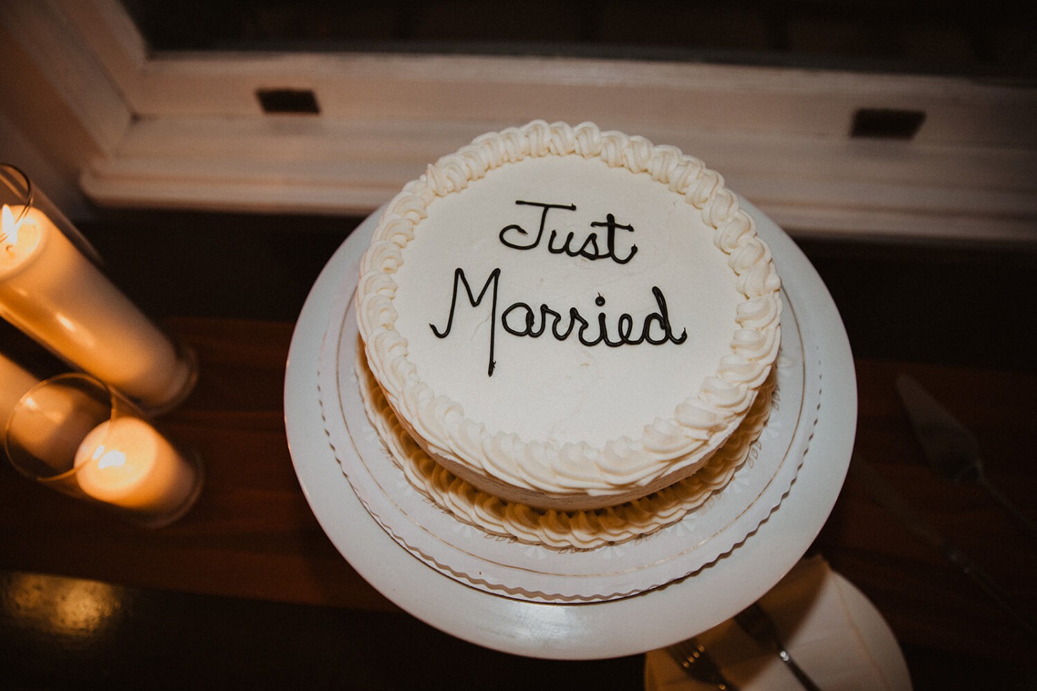 just married white wedding cake