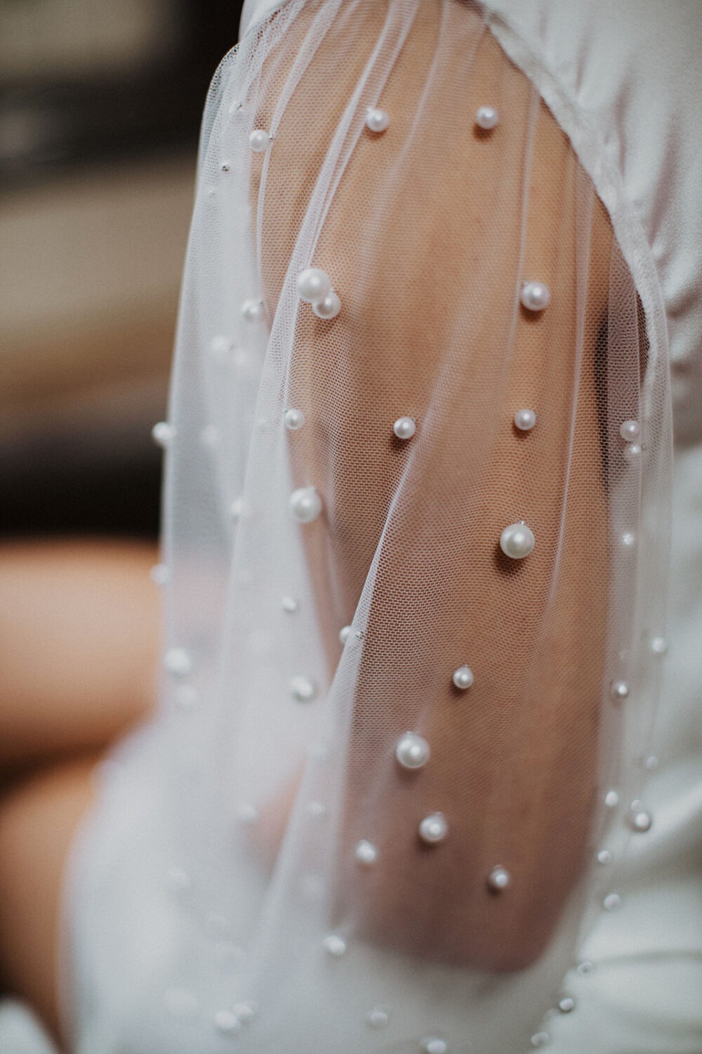 white pearls on wedding robe 