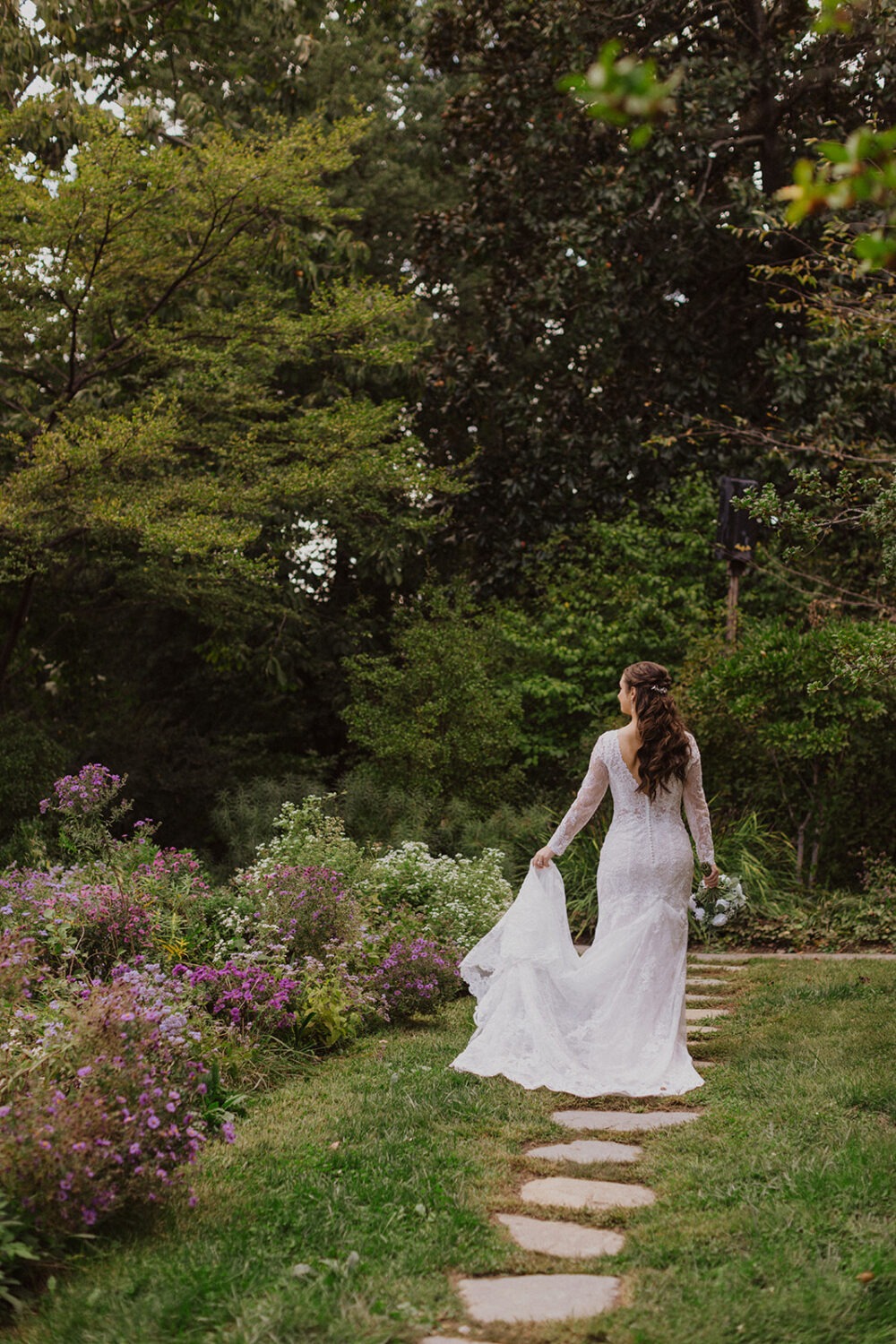 bride walks along garden path at Tudor Place Washington DC
