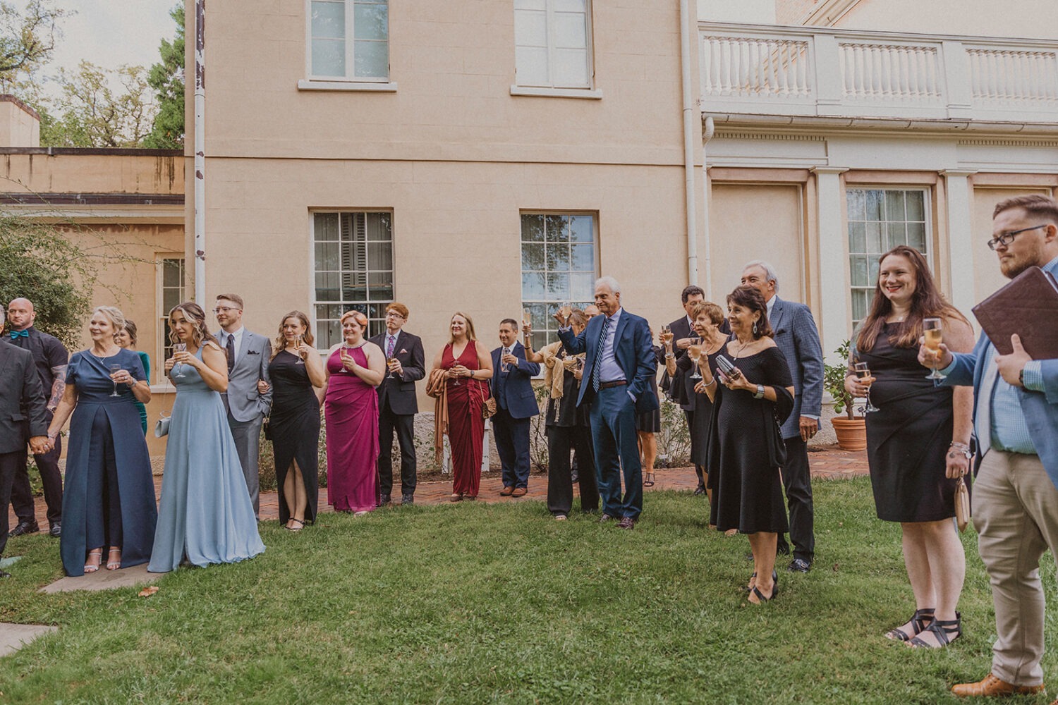 wedding guests toast with champagne 