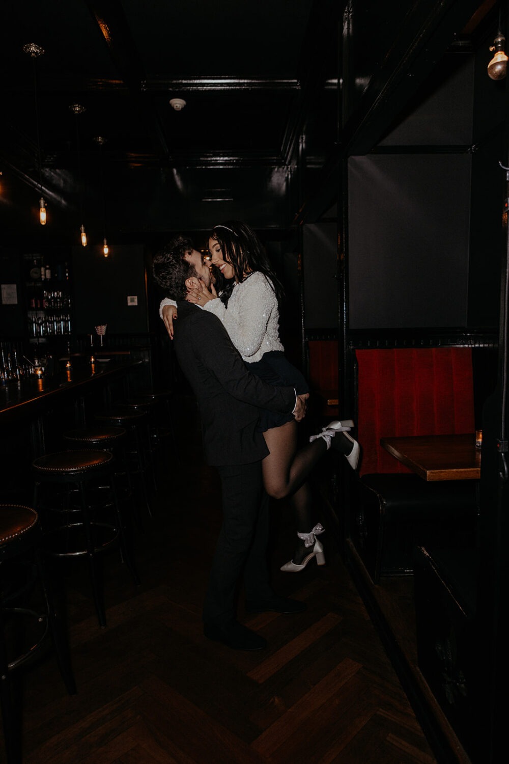 couple embraces at cocktail bars in DC